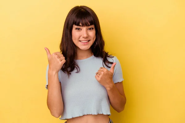 Young Caucasian Woman Isolated Yellow Background Raising Both Thumbs Smiling — Stock Photo, Image
