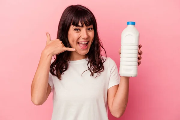 Young Caucasian Woman Holding Bottle Milk Isolated Pink Background Showing — Stock Photo, Image