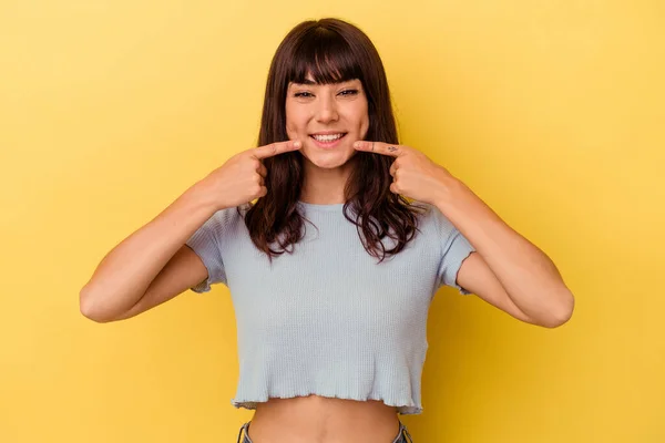 Young Caucasian Woman Isolated Yellow Background Smiles Pointing Fingers Mouth — Stock Photo, Image