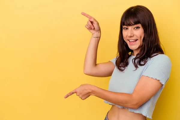 Young Caucasian Woman Isolated Yellow Background Excited Pointing Forefingers Away — Stock Photo, Image