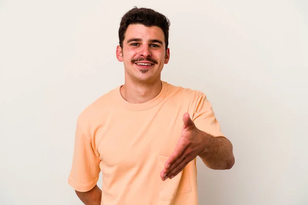 Young Caucasian Man Isolated White Background Stretching Hand Camera Greeting — Stock Photo, Image