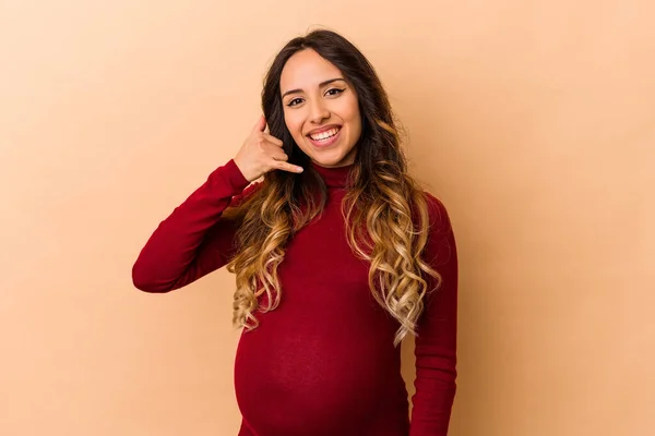 Young Mexican Pregnant Woman Isolated Beige Background Showing Mobile Phone — Stock Photo, Image