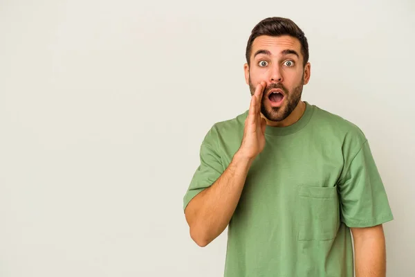 Young Caucasian Man Isolated White Background Shouts Loud Keeps Eyes — Stock Photo, Image