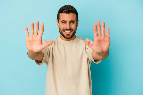 Young Caucasian Man Isolated Blue Background Showing Number Ten Hands — Stock Photo, Image