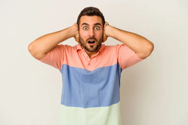 Young Caucasian Man Isolated White Background Covering Ears Hands Trying — Stock Photo, Image