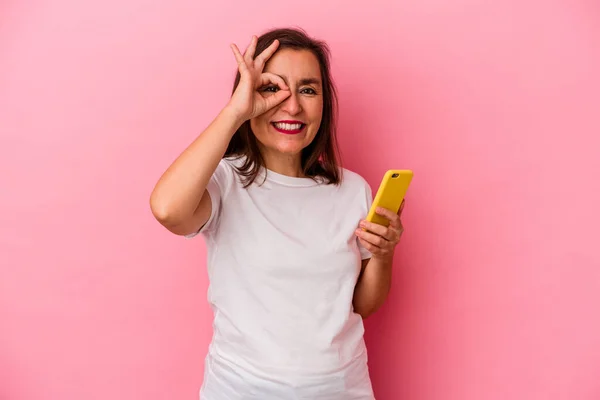 Middle Age Caucasian Woman Holding Mobile Phone Isolated Pink Background — Stock Photo, Image
