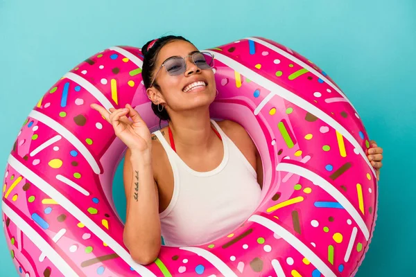 Young Latin Woman Holding Inflatable Donut Isolated Blue Background Joyful — Stock Photo, Image