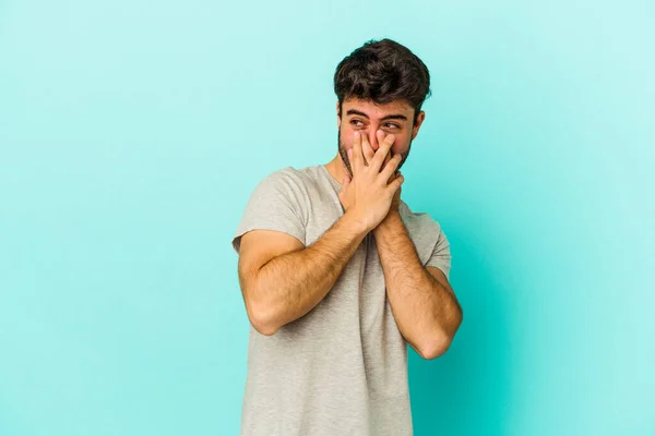 Young Caucasian Man Isolated Blue Background Laughing Something Covering Mouth — Stock Photo, Image