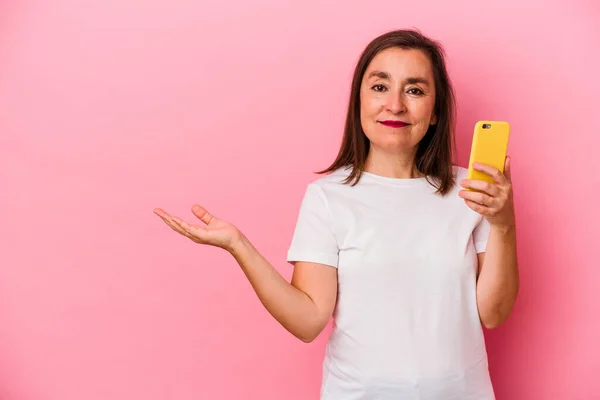Middle Age Caucasian Woman Holding Mobile Phone Isolated Pink Background — Stock Photo, Image