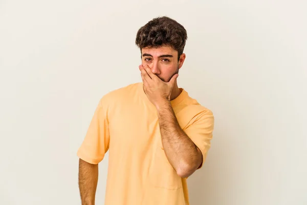 Young Caucasian Man Isolated White Background Covering Mouth Hands Looking — Stock Photo, Image