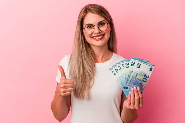 Young Russian Woman Holding Bills Isolated Pink Background Smiling Raising — Stock Photo, Image