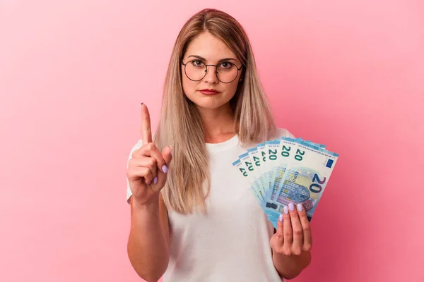 Young Russian Woman Holding Bills Isolated Pink Background Showing Number — Stock Photo, Image