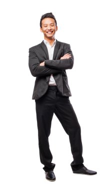 Asya işadamı kollarını geçerken