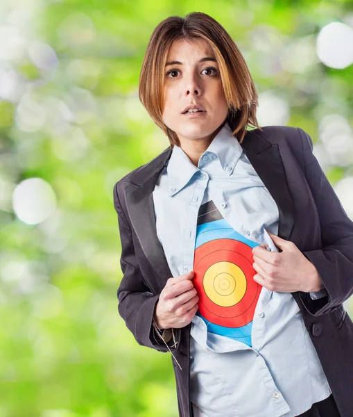 Businesswoman with target symbol — Stock Photo, Image