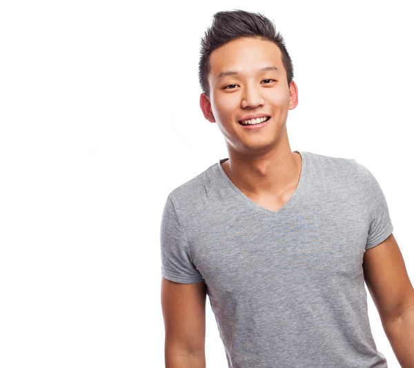 Handsome asian young man standing — Stock Photo, Image