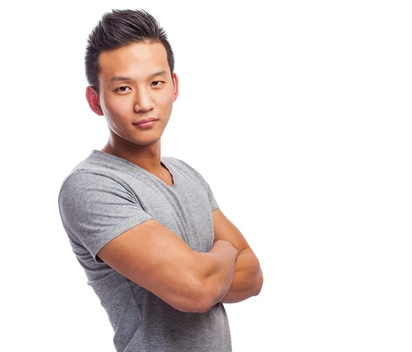Schöner asiatischer junger Mann steht — Stockfoto