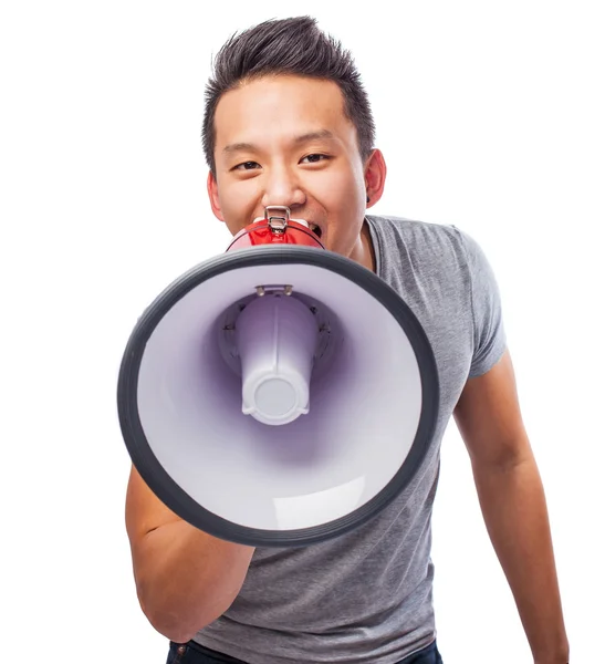 Jovem asiático homem com megafone — Fotografia de Stock