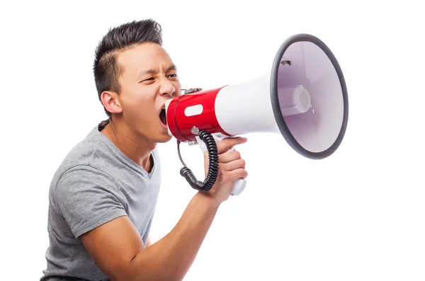 Jovem asiático homem com megafone — Fotografia de Stock