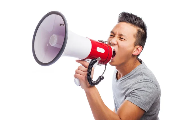 Young asian man with megaphone — Stock Photo, Image