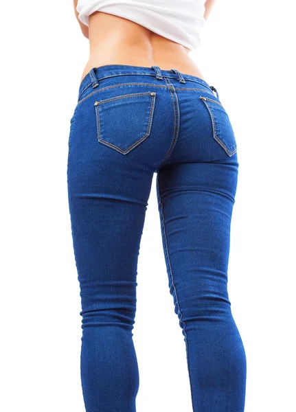 Mujer joven con pantalones vaqueros azules — Foto de Stock