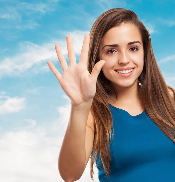 Elegante jonge meisje tellen met vingers — Stockfoto