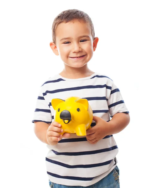 Little boy holding piggy bank — Stock Photo, Image