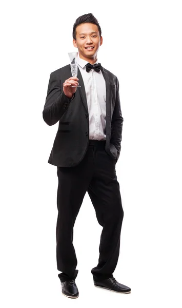 Asian man holding glass of champagne — Stock Photo, Image