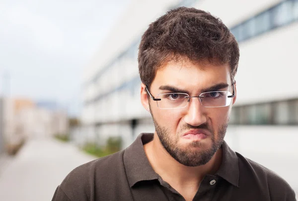 Angry man in glasses — Stock Photo, Image