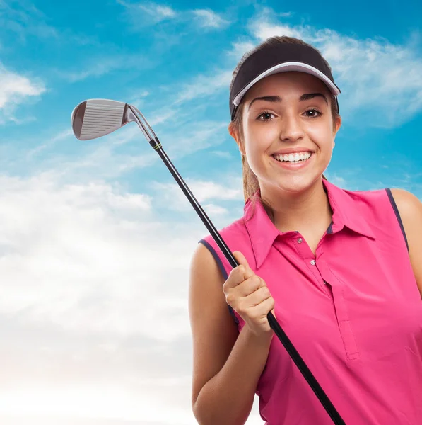 Hezká dívka drží golf hůl — Stock fotografie