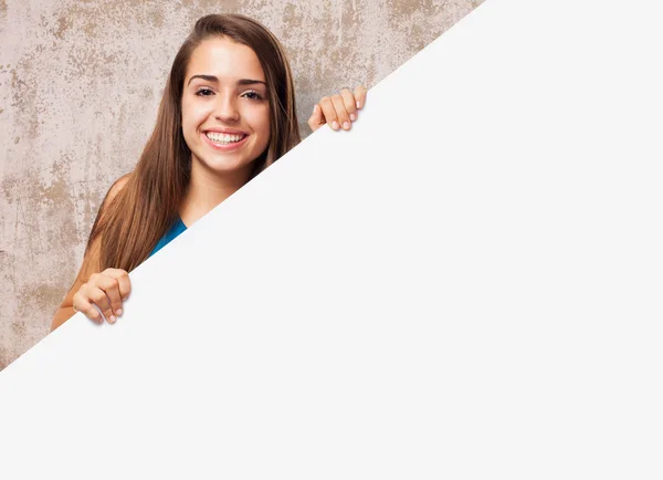 Pretty girl showing empty banner — Stock Photo, Image