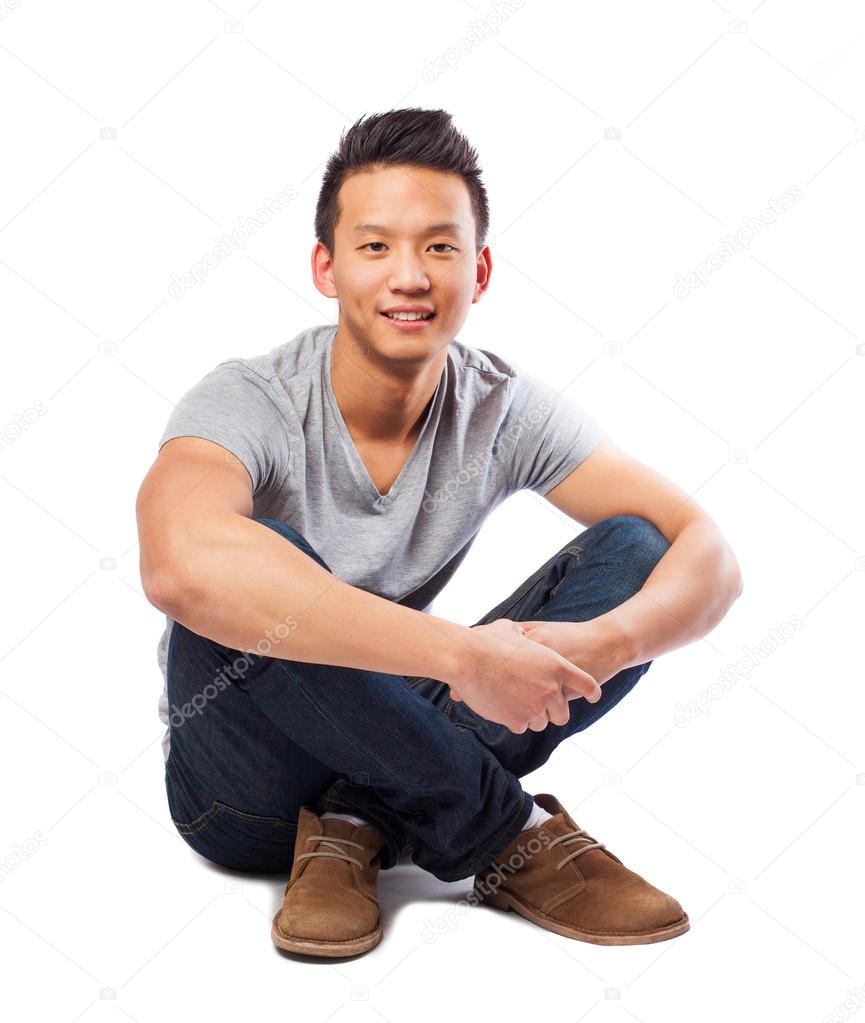 Asian man posing sitting