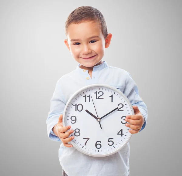 Μικρό αγόρι εκμετάλλευση ρολόι — Φωτογραφία Αρχείου