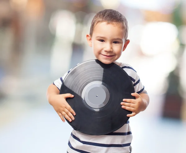 Menino segurando vinil recorde — Fotografia de Stock