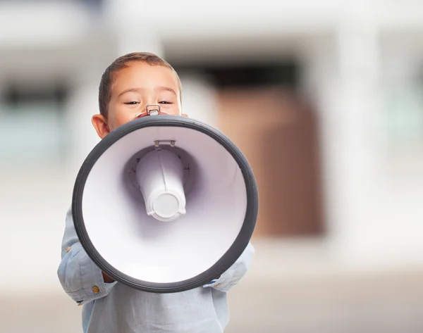 Menino cobrindo com megafone — Fotografia de Stock