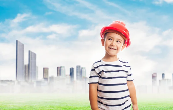 Niño pequeño con casco de albañil — Foto de Stock