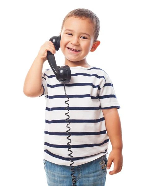 Kleine jongen praten over de telefoon — Stockfoto