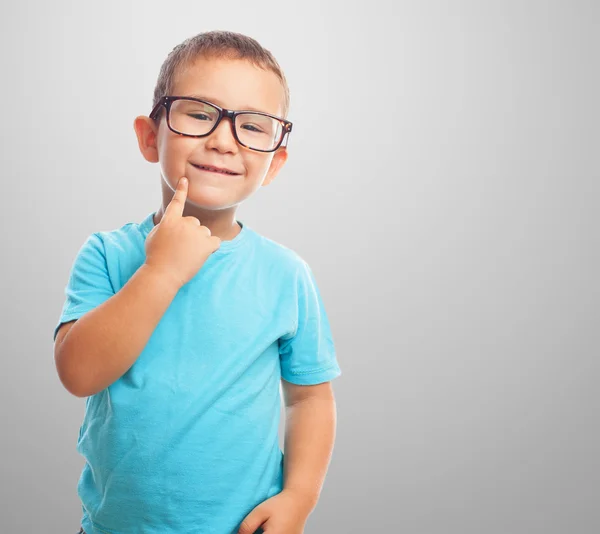 Kleine jongen met denk dat gebaar — Stockfoto