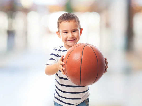 Little boy holding basket ball — Stock Photo, Image