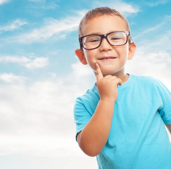 Little boy with thinking gesture — Stock Photo, Image