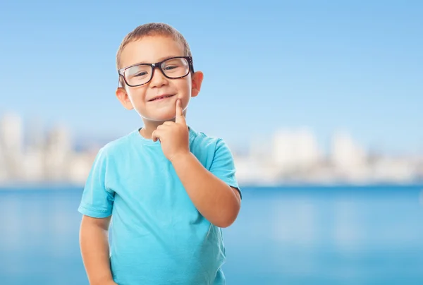 Menino com gesto de pensamento — Fotografia de Stock