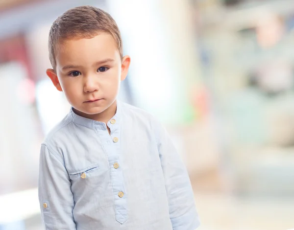 Little boy with serious gesture — Stock Photo, Image