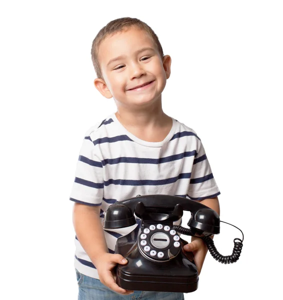 Kleine jongen bedrijf telefoon — Stockfoto