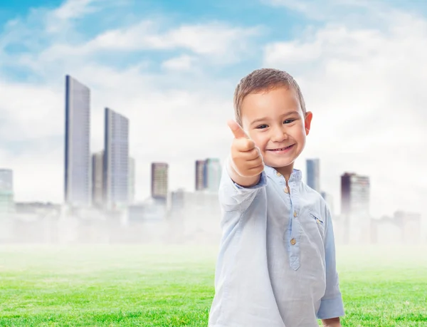 Little boy doing okay gesture — Stock Photo, Image