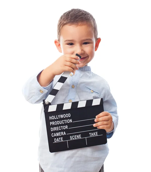 Little boy holding clapper board — Stock Photo, Image