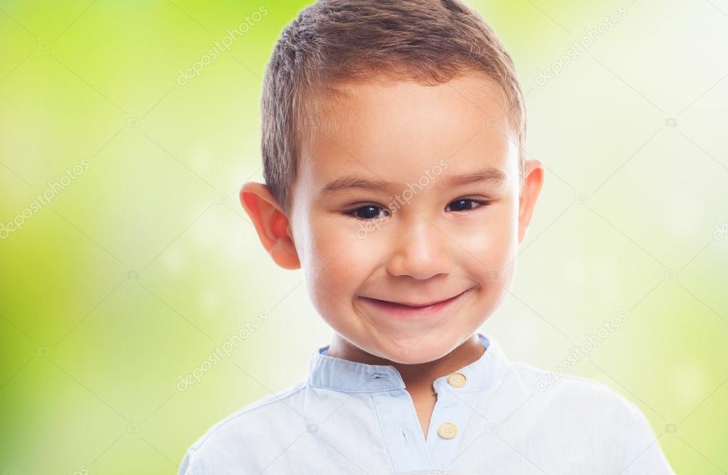 Little boy with smiling gesture