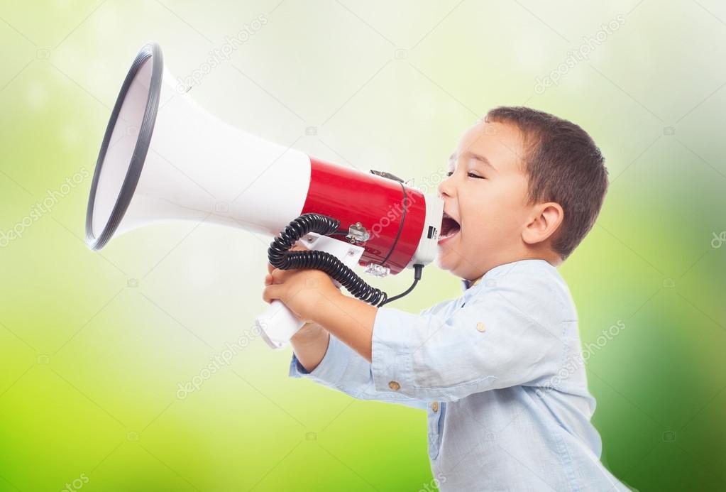 Little boy shouting with megaphone