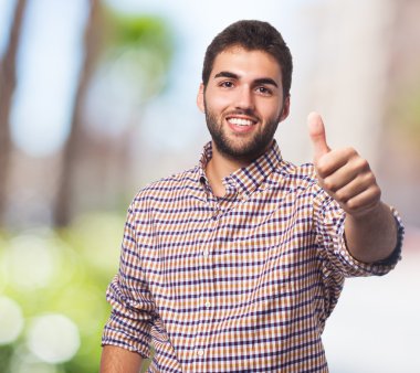 başparmak ile genç adam