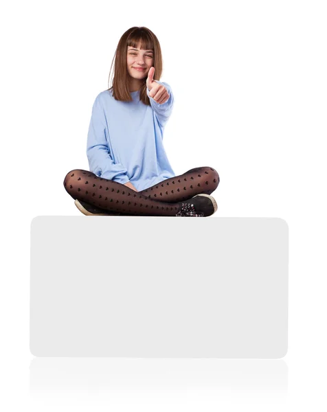 Young woman with thumb up — Stock Photo, Image