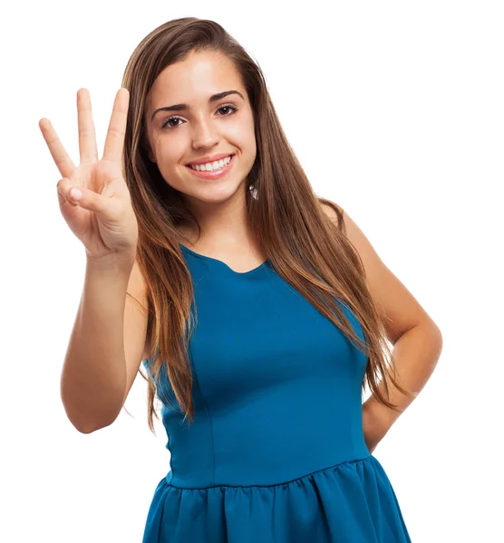 Pretty young woman counting with fingers — Stock Photo, Image