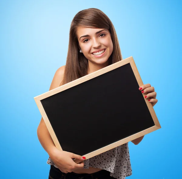 Pretty student holding chalkboard — Stock Photo, Image